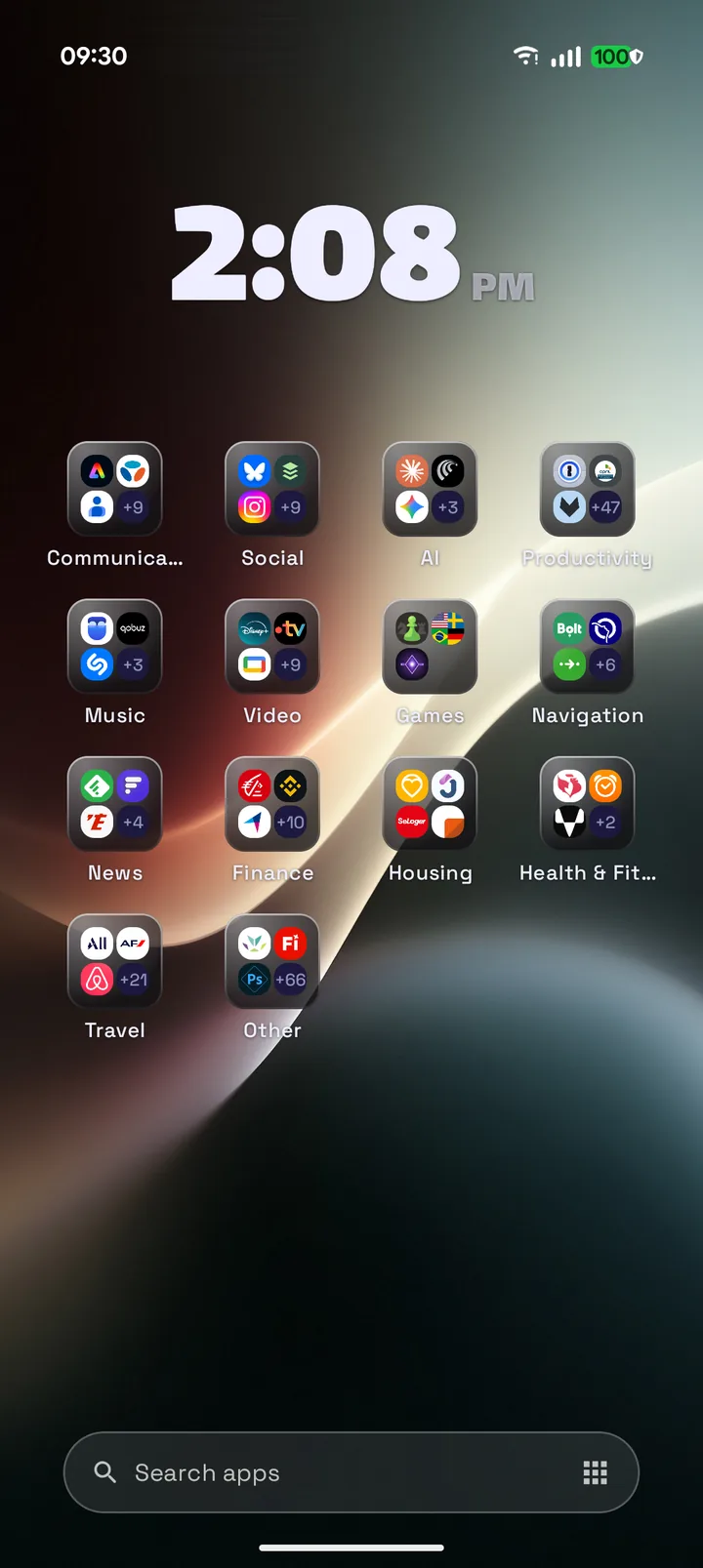 Mouture home screen with the Liquid Glass surface, wallpaper showing through the folders
